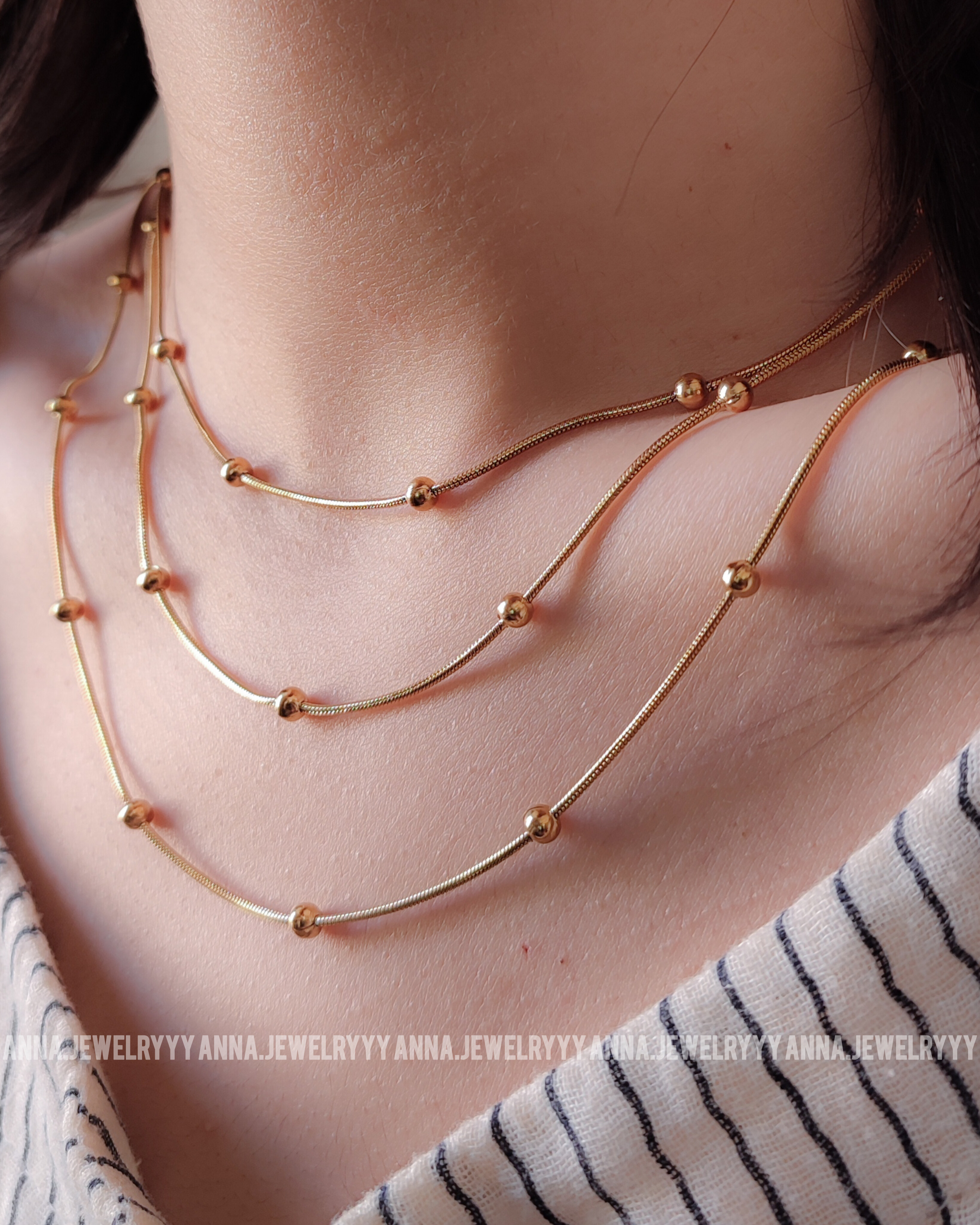 گردنبند سه لاین توپی - ماری طلایی استیل